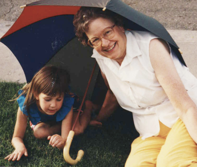 Me as a little human with my grandmother and a fort I had created with the clever use of an umbrella.